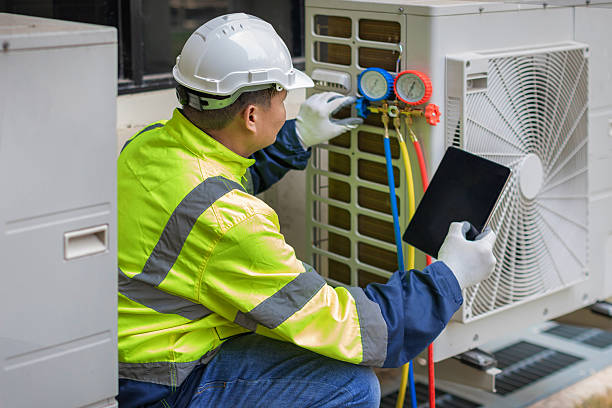 Professional Hvac Installation technician working in Whitsett, NC